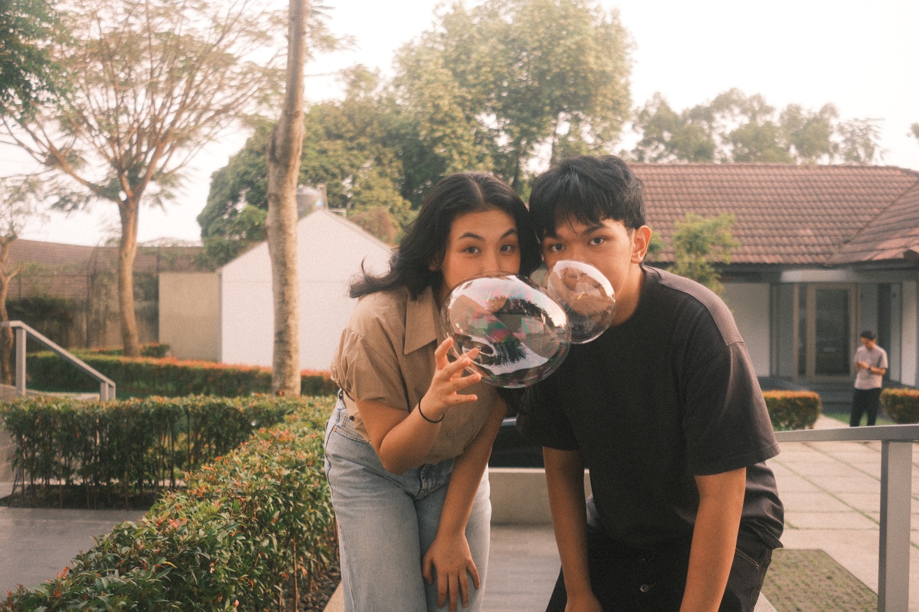 Us blowing little balloons together at Homeground